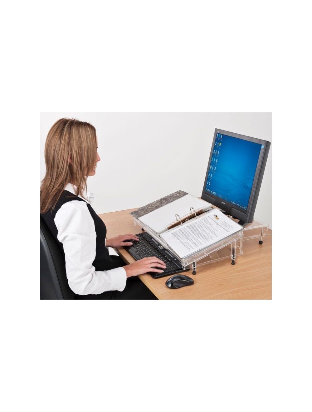 The higher paper ledge allows for larger books and ring-binders (pictured) to be placed on the Microdesk surface